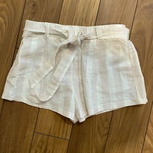 White and thinly striped shorts. Never worn.